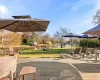 Deck featuring a lawn and a water view