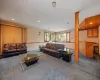 Living room with dark colored carpet