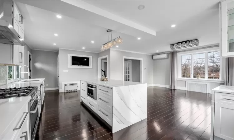 beautiful eat in kitchen with waterfall island