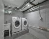 Laundry room featuring washing machine and dryer