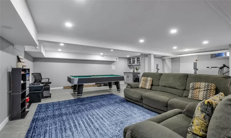 Playroom with indoor bar, wine cooler, and pool table