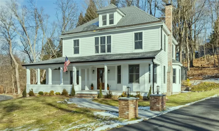 Classic 1910 Farmhouse featuring covered porch.