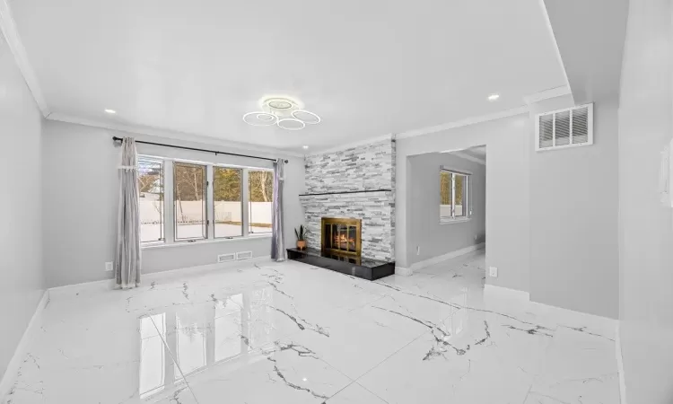 Unfurnished bedroom with dark wood-type flooring and ornamental molding