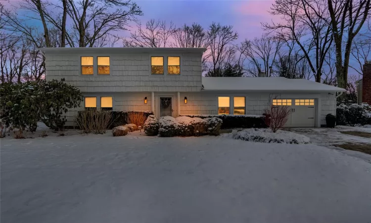 View of front of house with a garage