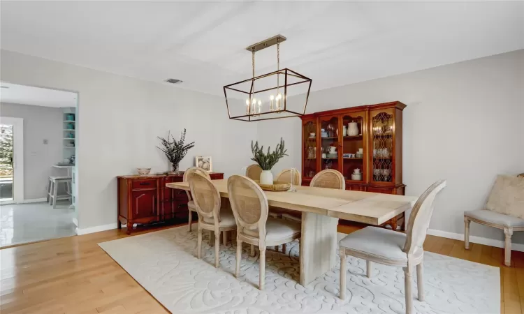 Dining room with light wood-type flooring