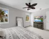 Bedroom featuring light hardwood / wood-style floors and ceiling fan