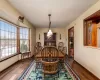 Dining space featuring dark wood-type flooring