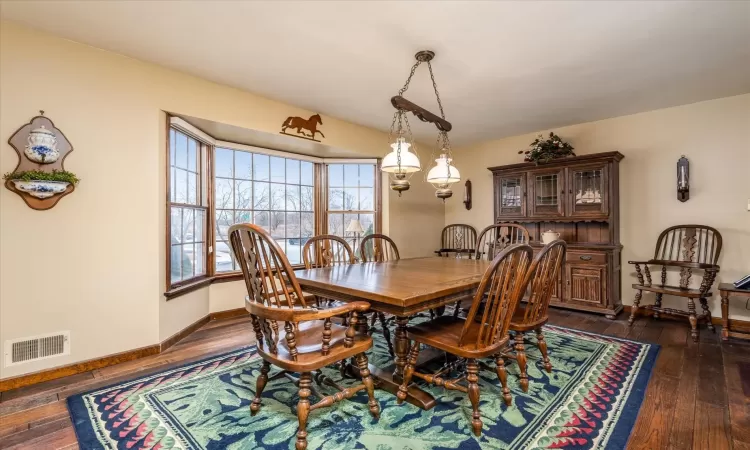 Dining room featuring dark hardwood / wood-style flooring