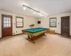 Rec room featuring rail lighting, carpet, and billiards