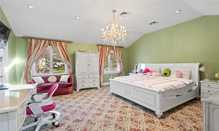 Bedroom with vaulted ceiling