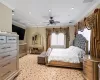 Bedroom featuring ceiling fan and crown molding