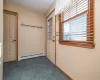 Entryway featuring a baseboard radiator