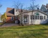 Back of house featuring a patio area and a yard