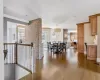 Dining area featuring dark hardwood / wood-style floors and crown molding