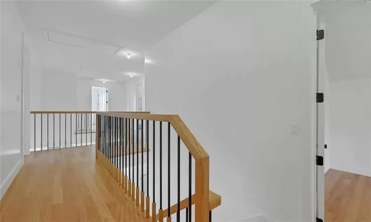 Hallway featuring light hardwood / wood-style flooring