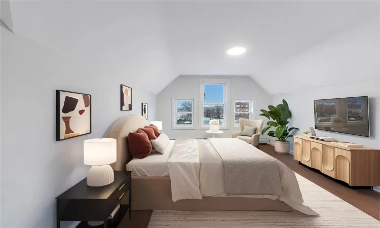 Virtually Staged Bedroom featuring dark hardwood / wood-style flooring and lofted ceiling