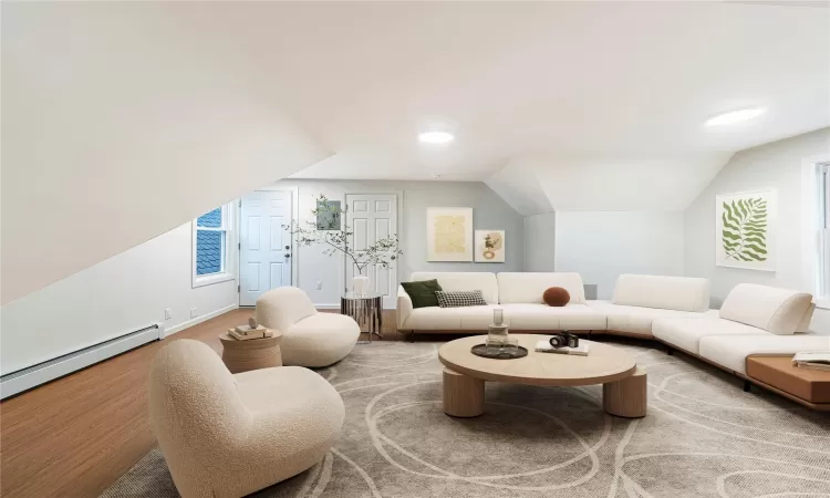 Virtually Staged living room with a wealth of natural light, vaulted ceiling, and baseboard heating