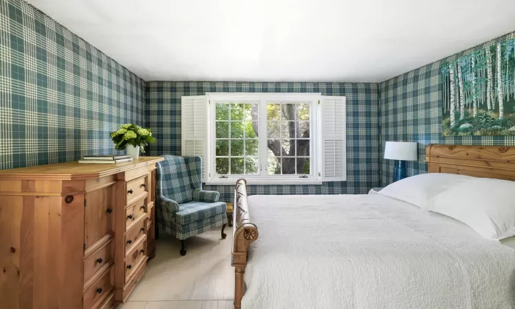 Bedroom featuring light tile patterned floors