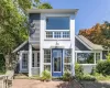 View of front of house with a patio