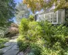 View of yard with a sunroom