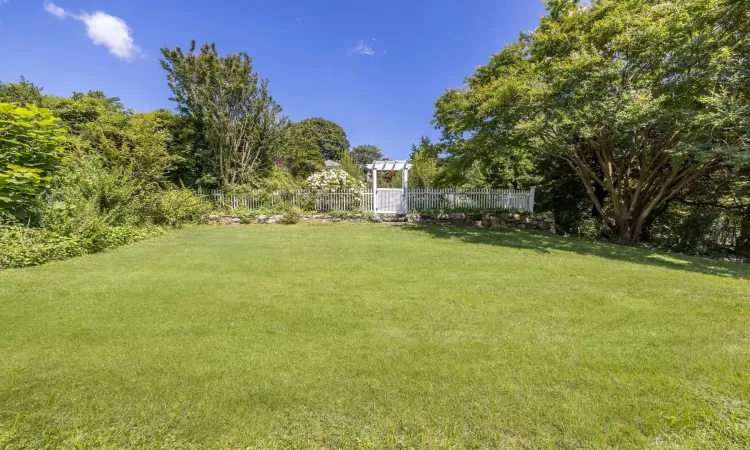 View of yard featuring a pergola