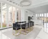 Dining area featuring ornamental molding