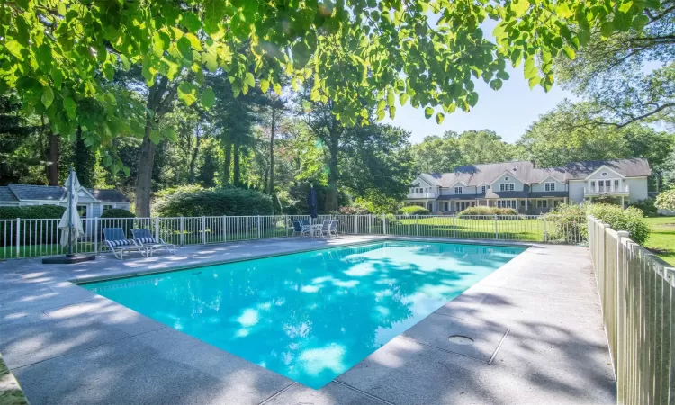 View of yard with a fenced in pool