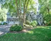 View of front facade with a garage and a front yard