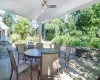 View of patio / terrace with grilling area and an outdoor living space with a fire pit