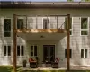 Back of house with a patio area