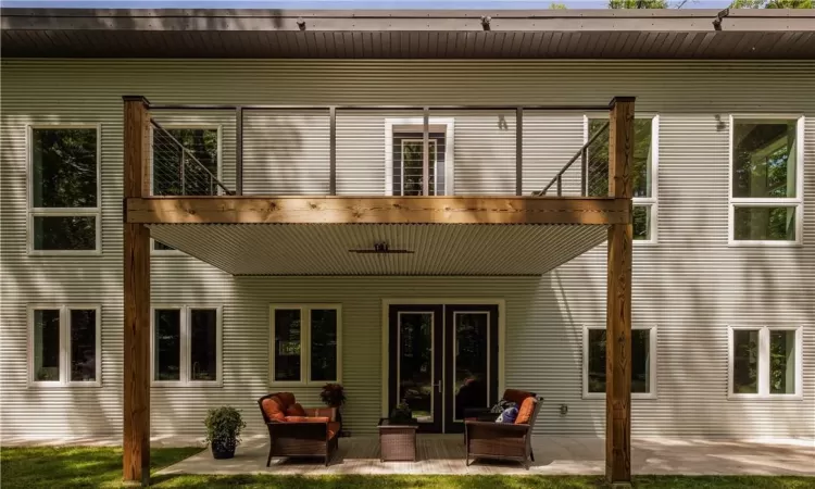 Back of house with a patio area