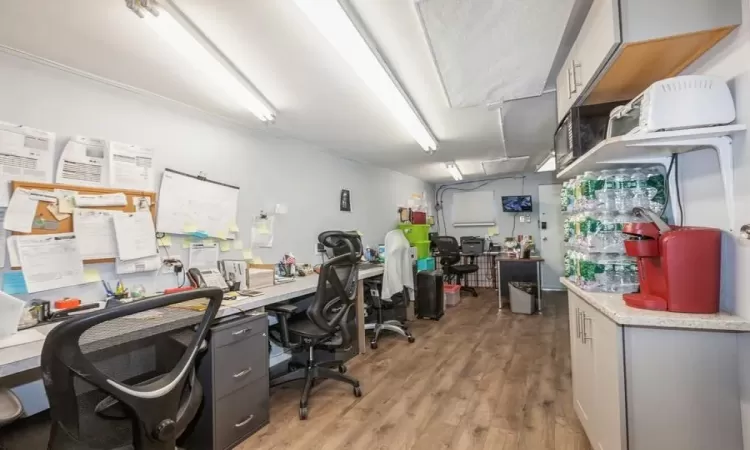 Office space featuring hardwood / wood-style floors