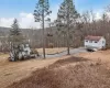 View of yard with a garage