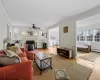 Living room with plenty of natural light and light parquet flooring