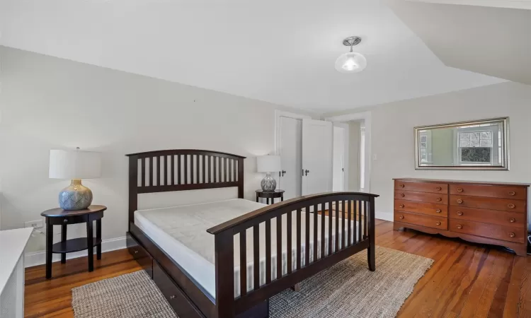 Bedroom featuring wood-type flooring