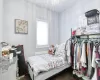 Bedroom with dark wood-type flooring