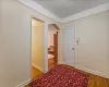 Corridor featuring hardwood / wood-style floors