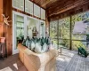 Sunroom featuring wooden ceiling