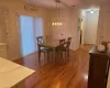 Dining room with dark wood-type flooring