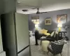 Living room featuring ceiling fan