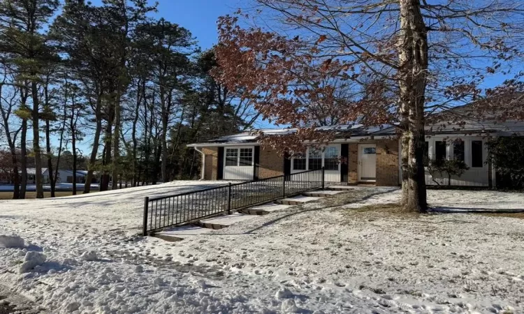 View of snow covered property