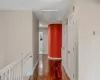 Hallway featuring wood-type flooring