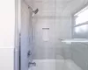 Bathroom with tiled shower / bath