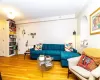 Living room with hardwood / wood-style floors