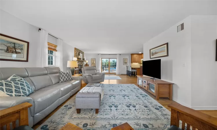 Living room with light wood-type flooring