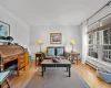 Living room with wood-type flooring