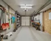 Garage featuring a garage door opener