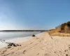 View of water feature with a beach view