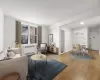 Living room featuring radiator and wood-type flooring