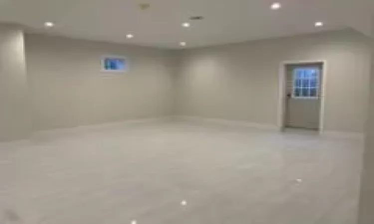 Unfurnished room with light wood-type flooring